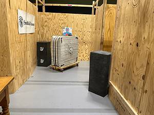 Airsoft shoot house lane with wooden partitions and target